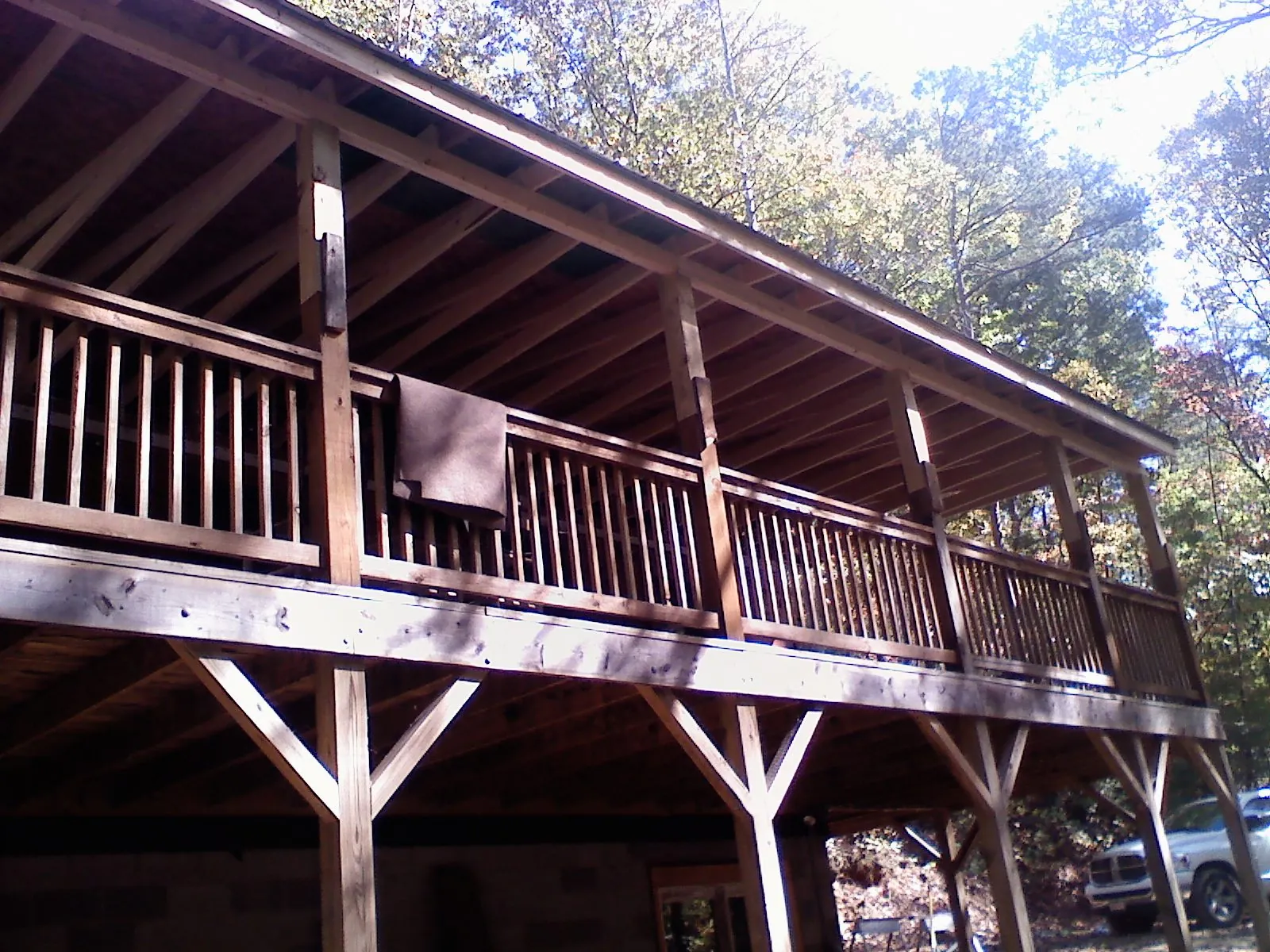 Timber framing under a new elevated porch and deck — Roof Leak Repair in Chanute by Roofing Brothers